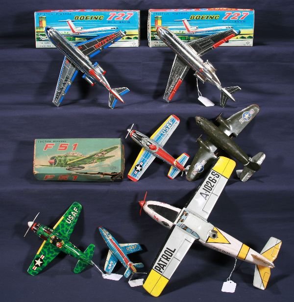 NETTE - 7 Airplane Toys, some Boxed:: Sized by wingspan- 14" Police Patrol, C7; 7", Yone, PF-256 Fighter, C8; 4", Haji, F-104 Jet, C6; 10" Marx DC-3, C5; 8" F-51 Fighter, SY, ob worn, C9; 9" American Boeing 727, TT, ob C9+; 9" Pan Am Boei