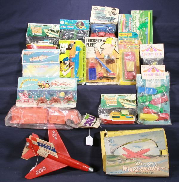 NETTE - Large Group Hard Plastic Toys in Packaging: If you like plastic and you like mint, here ya go! HP Fleetwood wind-up sub(rubber band dry); HP Old Mc Donald & His Discontented Cow; Vinyl Toy Fair Truck Assortment; HP Dock side Fleet, Strauss; HP