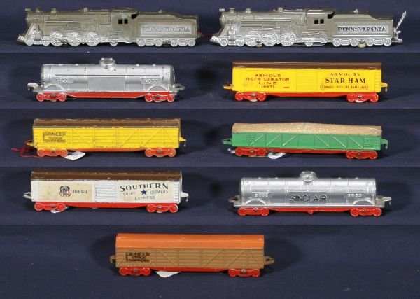 NETTE - 9 Pc. TOOTSIETOY Train Lot:: 2 Variations PRR Loco & Tender; Tank Car; Armor Reefer, nice decals; 2 Variations Pioneer Stock Car; SLSF Gondola; Sinclair Tank Car; Southern Boxcar, decals have minor staining, all unbroken, C6-8