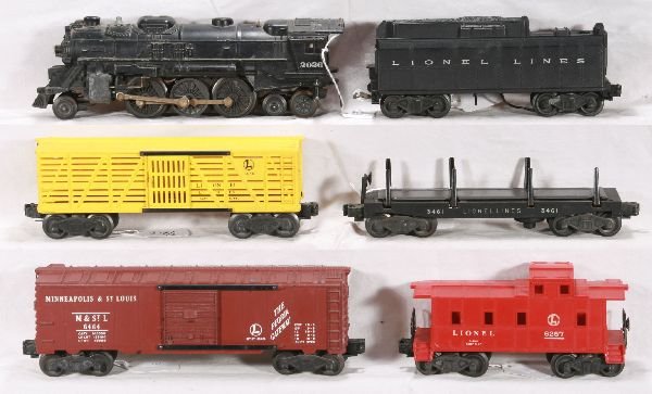 NETTE - 6 Pc. LIONEL 2026 Steam Freight Set:: 2026 Loco, missing 1jewel, 1 broken step; 6026W Tender; 6656 Stock Car; 3461 Lumber dump Car, no load; 6464-50 M&StL Boxcar, type I; 6257 Caboose, o/w C6-7