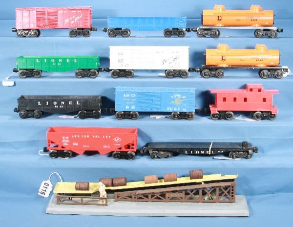 12 pc LIONEL Train Lot:: 6424 black flat car; 6014 Frisco box car; 6476 LV red hopper car; 6142 black gondola car; 6044 Airex box car; 6465 orange Tank car; 6142 green gondola car; blue LIT gondola car; 6014 red Frisco box ca