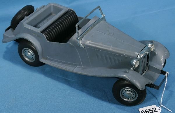 Diecast DOEPKE MG Sports Car:: Clean, but incomplete, tougher gray painted body is loose from chassis, original unbroken wind screen, grill/light piece is missing 1 side support, also missing steering wheel & Boot, what is here vis