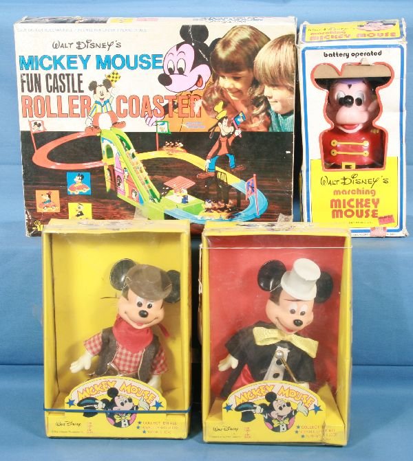 4 Boxed Disney Toys: Ilco, Mickey Mouse Fun Castle Roller Coaster, bat. Op., untested, has 1 Donald Duck Car; Ilco Mickey Mouse Parade manager, Bat. Op. Untested; Durham Mickey Mouse Cowboy Figure & Mickey Mouse Band Lead