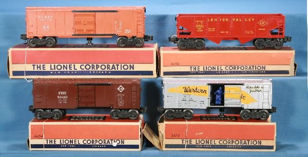 NETTE - 4 Boxed LIONEL Freight Cars:: 3484-25 SF Oper Boxcar, type IIb, C8; 6456 -75 LV Hopper, Gloss red w/yellow lettering, ob has no suffix, C6; 3474 WP Oper. Boxcar, clean w/rough ob, C7; 6454 Erie Boxcar, ob C7