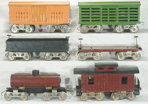 NETTE - 6 Early LIONEL Freight Cars:: ST. Ga., Makes a nice set with the 42 in the previous lot! 14 CM&StP Boxcar, C7; 11 Flat car, C6; 16 PRR Tank Car, clean w/nice lettering, C6+; 13 Stock Car, some truck oxi, C6; 12 Lake Shore Gondola,