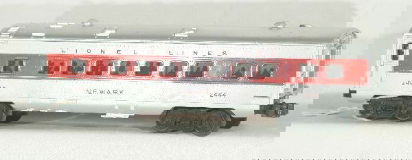 NETTE - Scarce LIONEL 2444 with Gloss Stripe!: Very hard to find original gloss striped cars! This Newark is very nice with even silver and high gloss stripes. Lightly run, C7 Tough!