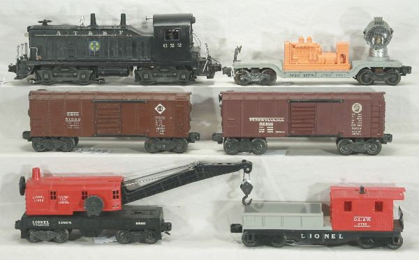 NETTE - 6 Pc. LIONEL Diesel Freight Set:: 622 NW-2 Diesel w/Bell, relettered, C5; 3620 Searchlight Car; 6454 Erie Boxcar; 6560 Crane; 6454 PRR Boxcar; 6119-100 Work Caboose, o/w C6