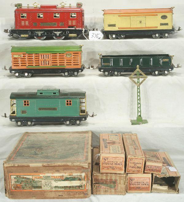 NETTE - Nice Boxed LIONEL Set 299E:: Circa 1933, 251 Boxcab Electric, rewheeled; 812 Gondola, C6; 813 Stock Car; 814 Boxcar, small red paint spot on roof; 817 Caboose, all should polish nicely! Obs, a few missing flaps, 95, 068 sign, osb