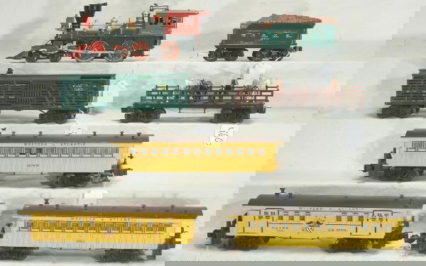 NETTE - 7 Pc. LIONEL 1872 General Set: Deluxe extended version. 1872 Super O General w/smoke, some glue on cab, replaced cowl section; 1872T Tender; 1876 Baggage; 1865 Coach, roof chipped, C5; Scarce 1875W Whistling coach, 1 broken step; 1