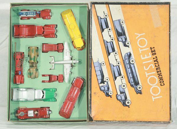 NETTE - Boxed TOOTSIETOY Set 5210 Commercial Set: Set includes 2 Fire Ladder Trucks, 1 gold ladder broken, missing 1 ladder; 2 Large Pick-up; Small Pick-up; Delivery Van; United 4-prop plane; 2 Standard Oil Trucks; Fire Water Cannon, restoration; Mil