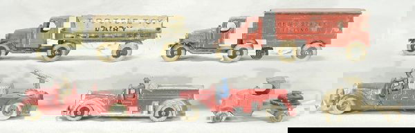 NETTE - 5 Early TOOTSIETOY Vehicle Lot: Long Distance Hauler; Dairy Truck; Fire Truck Water Cannon, handle incomplete; Hose Truck, touched-up, C5-6