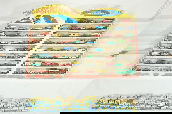 NETTE - Scarce MATCHBOX 1-75 Store Display Full: Circa 1968 from Fred Bronner, 24 X 32" w/easel backs. Includes complete set of 1 to 75 series, mostly BPWs w/#69 Shovel in GPW. 10 or so are well played with, rest in the C8 range, includes about 44 o