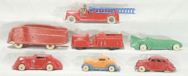 NETTE - 7 Pc. Vehicle Lot:: Super TootsieToy Fire Ladder Truck, C9; Tootsie Airflow has 1 broken axel support; Tootsie #8 Racer; Midgetoy Fire truck; Barclay Sedan & T-tone Coupe; Sun Rubber Truck, o/w C7-8