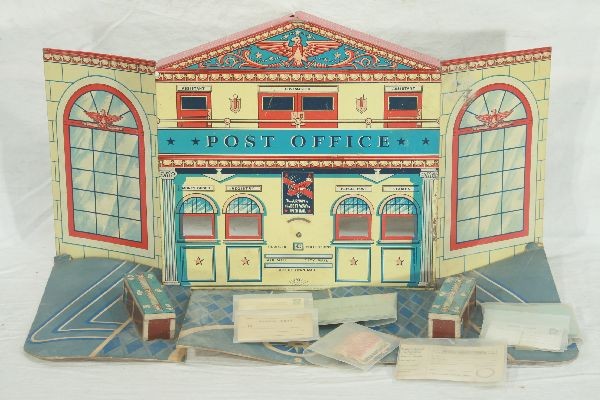 NETTE - WOLVERINE U.S. Post Office Playset:: Metal Building, opens to 23" W, includes cardboard floor w/counters, 4 Envelopes, some used, 4 pc paper; 4 Picture Postcards; Stamps, some removed; 3 Parcel post Tags; 3 Postal cars; 2 Money order for