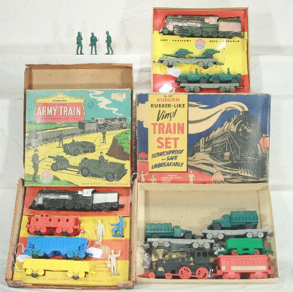 NETTE - 3 Boxed AUBURN RUBBER Train Playsets:: 5 Pc. Troop Transport Set in 525 Freight Set box; 945 Army Set w/insert; 965 Union Station 7pc set, station graphics osb w/insert, o/w C8-9