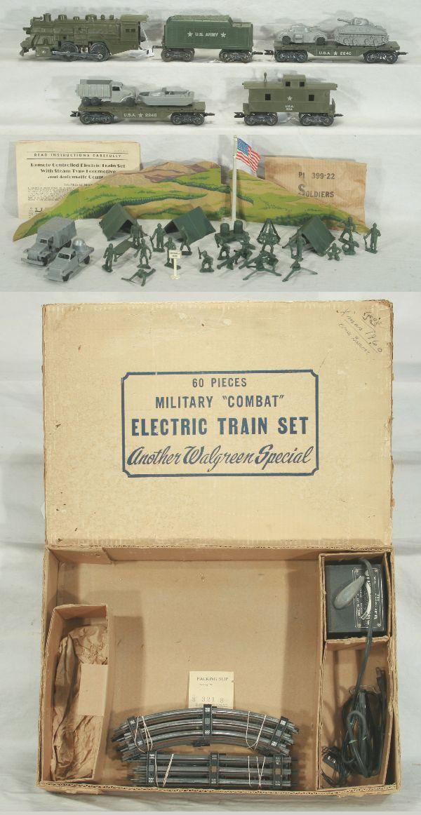 NETTE - Scarce MARX WALLGREENS Military Set:: 24965 "Combat" Set: 400 khaki Steam Loco; US Army Green Tender; 2246 Flat w/DKW & Open Stake Truck; 2246 Flat w/Armored Car & Tank; 234 USA Caboose; includes Covered truck, Searchlight Truck, Flag Pol
