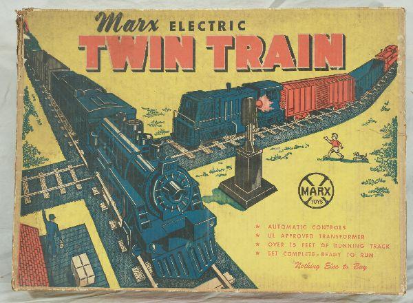 NETTE - Scarce Boxed MARX Twin Train:: First One we've had! 400 Steam Loco; NYC Tender; PRR Gondola, silver; CS Tank Car; NYC Tender; NYC Diesel Switcher; LV Hopper; B&O Boxcar; NYC Caboose, Figure-8 track w/Block signal, osb, top has 1 sp