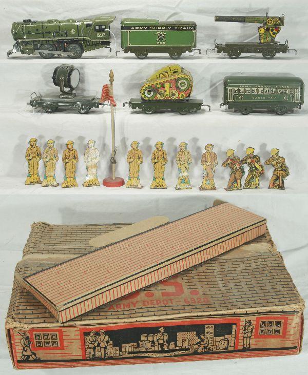 NETTE - Nice MARX Military Barracks Boxed Set:: Set #5928; 897 Litho military Loco; 500 AST Tender; Scarce Non-Electric Searchlight; Flat w/Khaki Tank, clock work working; Litho AA Gun, C6-; Radio Car, Flag pole; 11 Tin soldiers, Barracks Box w/pla