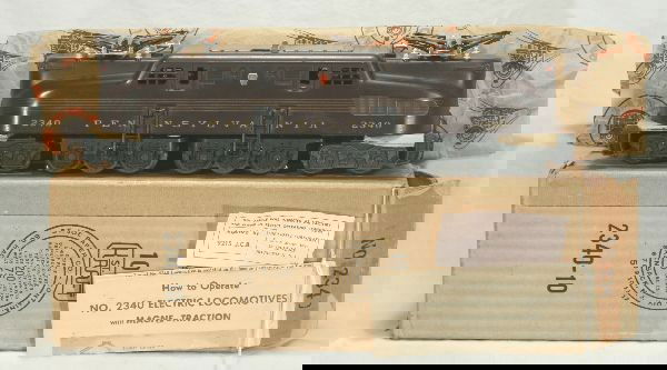 NETTE - Super Boxed LIONEL 2340 Tuscan GG1: Very clean w/excellent patina. 5-stripes are bright and 98%, very lightly run, instr., insp. Label & wrapping. Nice ob(-10) w/insert, C8+ WOW!