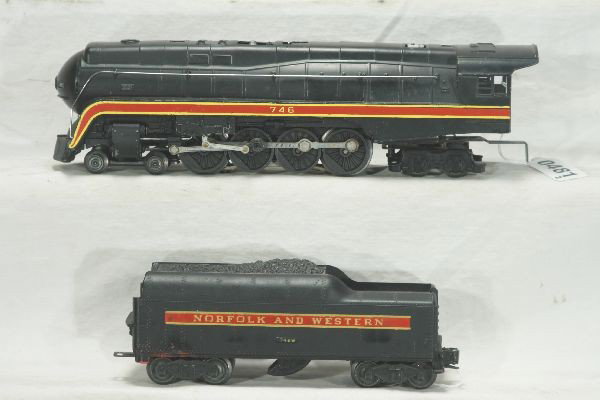 NETTE - LIONEL 746 N&W J Steam Loco:: Clean loco, nose paint 50%, original light insert; stripe has no touch-ups, C6; 746W SS Tender, 1" paint rub one side, steps intact, C5