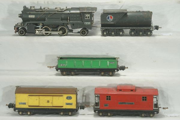 NETTE - 5 Pc. LIONEL 255E Freight Set:: Tough 255E Steam loco, original frame, steam chest is an original black version; 263W tender, missing handrails; 812 Gondola; 814 Boxcar; 817 Caboose, all MBC, C5