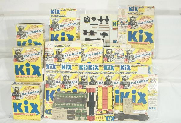 NETTE - 19 Pc. GENERAL MILLS Kix Train Premiums:: Most still on complete cereal boxes, a few are trimmed, but appears to have the whole series, but not guaranteed, 2 are stained, o/w clean & bright.