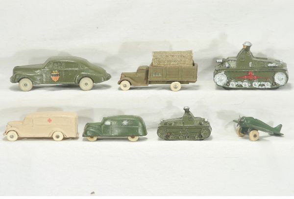 NETTE - 7 Nice Rubber Military Vehicles:: Auburn Rubber - 6" Olds Staff car; 4 1/2" AUB-RUBF Tank; 3" Tank; Sun Rubber 4" Plane; 4" Army Van; unmarked 5" ambulance & covered truck, C6-8