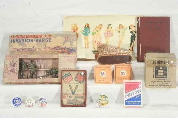 NETTE - 12 Pc. WWII Toy & Ephemera Lot:: Unusual 1943Vargas Pin-ups decal; Army & Navy song & prayer book; Victory palm puzzle; 2 Victory lapel pins, on card; 4 Pins- Anti Hitler animated 1 1/2"; 1 5/16" V-J Day; 1 1/4" Jap Hunting License; 