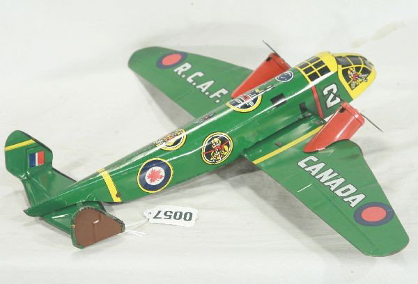 NETTE - Scarce MARX RCAF DC-4 Canadian Plane: Litho Tin 18" WS. Two-prop made for Canadian Market, clock work working w/rubber tires, clean & shiny, C7+ Tough!