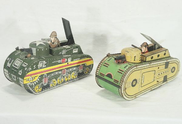 NETTE - 2 MARX Doughboy Tanks: Both 1940s-50s models, 10" Thin litho, working, lighter color tank has red uniform soldier, and is a bit faded & dirty, C5-6, other is C7