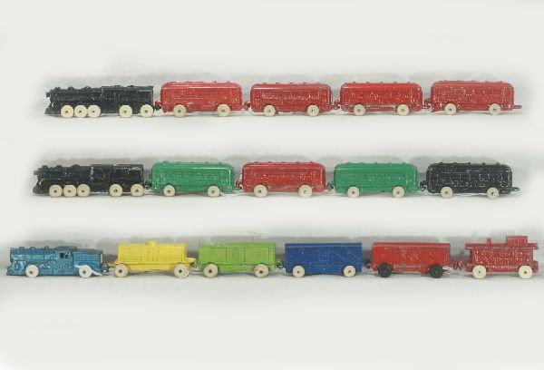 NETTE - 3 BARCLAY SAMPLE Train Sets, Plus:: Also from Barclay Factory. Steam Loco, wheels different on both sides; w/4 Red coaches; Steam Loco all white tires w/2 Green, black & Metallic Red Coaches; Small steam loco w/Tank, 2 Boxcars, Stock & 