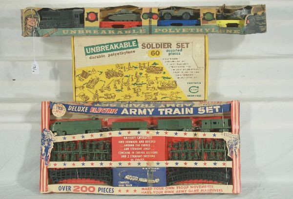 NETTE - 3 Boxed Plastic Military Train Sets:: Lido Military Flat car train w/tank, jeep & soldiers, ob worn; Corbex 60 Pc. Soldier set w/vehicles, osb w/inserts, C10; Tico military Set, Bat. Op. Untested, HP w/cars, dozens of soldiers & accessori