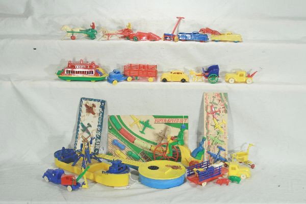 NETTE - 35 Pc. Hard Plastic Vehicle & Toy Lot:: Nice assortment, guitar is 16" L, all papers intact, a few missing loose pieces, some unusual items, As Per Photo, most will clean nicely.