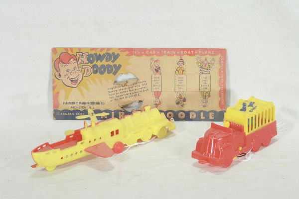 NETTE - Scarce HOWDY DOODY Air-O-Doodle, Plus!: Kagran Hard Plastic 8" Air-O-Doodle, unbroken w/original card; Plus the 5" truck w/monkey cage to the Howdy Doody Circus Set, also unbroken, C8 Scarce!