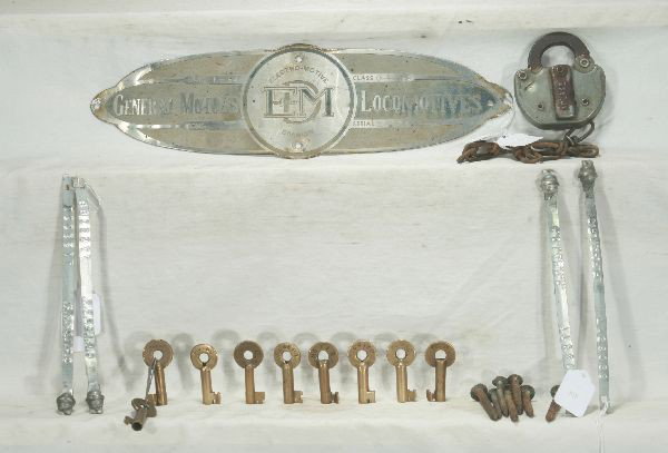 NETTE - RR Locks, Plate & Misc. Lot:: Boiler plate from General Motors EMD, dated 1-64L&N RR Lock w/6pc chain; 10 RR Keys, many have road names, EL&ERY, MOPAC, CRI&P, MP; L&NWRR, BNINO7 RR Nails; 4 CRI&PRR Boxcar seals.