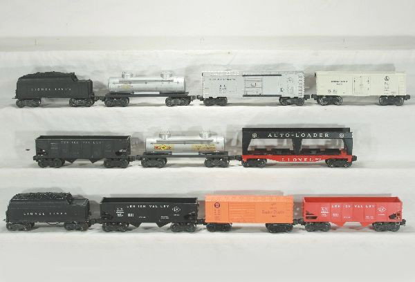 NETTE - 11Pc. LIONEL Rolling Stock Lot:: 2 #6466WX Tenders, frames redone; 6465 tank; 64645-1 Boxcar; 6456 Hopper; 2465 Tank Car; 6414 Empty Auto-Loader; 6472 Reefer; 6476 Hopper; 6004 Boxcar; 6456 Hopper, o/w Well played with, some chips, p
