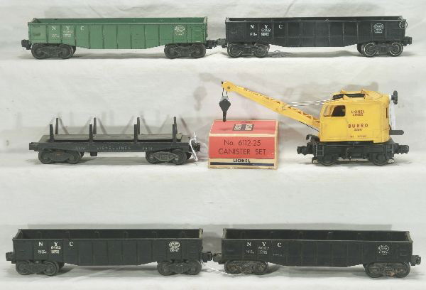 NETTE - 7 Pc. LIONEL Derrick Work Train: 3360 Burro Crane Loco; 4 #6462 Gondolas; 3451 Lumber Dump; 6112-25 Canister set, canisters worn, ob, o/w Shows signs of moderate playwear, may be dirty, but will clean. No major damage. May have small