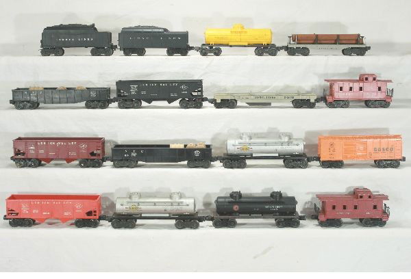 NETTE - 16 Boxed LIONEL Freight Cars: 6257 Caboose; 2 #6465 Tank Cars; 2 #6462 Gondolas w/drums; 3361X Log Dump; 6456 LV Hopper; 6411 Lumber Car; 1130T tender; 6015 Tank Car; 2456 Hopper; 6476 Hopper; 6014-85 Bosco Car; 6465 Gulf Tank, ru