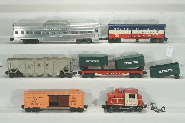 NETTE - 7 Pc. LIONEL Lot:: 2532 Vista-Dome; 632 Ice Car, 4-lines; 3460 Van Flat; Extra incomp. Van; 6446-25 Covered` Quadhopper; 3494-275 SOM Oper. Box; 56 M&StL Switcher, broken, o/w Well played with, some chips, possibly inco