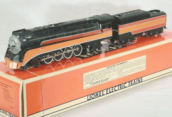 Lionel SP Daylight Locomotive and Tender Lot: 6-18007 SP GS-2 Daylight 4-8-4 die cast metal construction Magnatraction. Ob. Is like new.