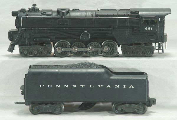 Lionel 681 Turbine Loco: Clean with nice cab lettering, matte patina and bright nickel, nose decal 100%, 2046W-50 PRR Tender, Has light to moderate play wear.