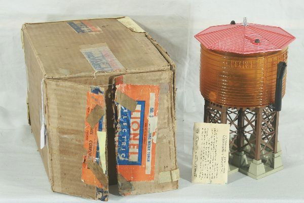 Boxed Lionel 38 Pumping Water Tower: Overall nice piece. Replaced hoses, screen has some corrosion inside. Roof is clean but missing the washers. Has original packet with some dye tabs, missing funnel, ob is rough and taped with 1 loose