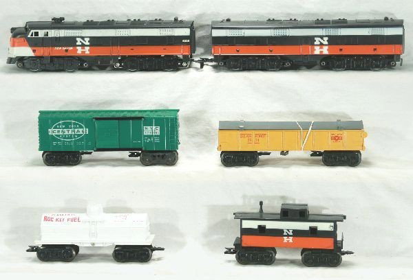 Unusual boxed Marx Allstate Diesel set 9620: 2002 NH E7 AB diesels, very bright clean graphics, Air Force rocket launching car complete, NYC boxcar minor factory wear at lettering, unusual Allstate rocket fuel tank car, NH caboose, all F trucks,