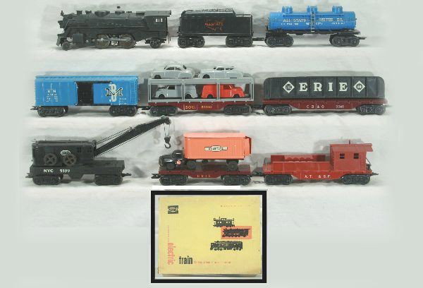 Nice boxed Marx Allstate set 9634: 666 cast steam loco, Allstate tender, CB&Q flat w/ girder, orig. hold downs, SOU Auto-loader, Allstate tank car, B&M box car, minor oxidation on hand rails, Erie flat w/ orange Allstate trailer, rare 