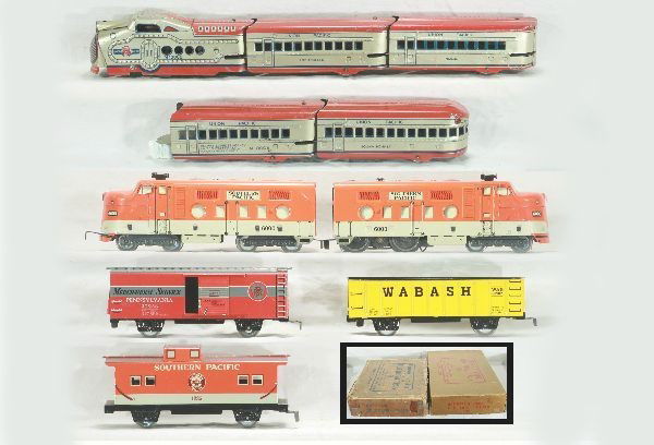 2 Boxed Marx tin sets: 9606 RS: Unusual pre-war M10000 set, UP diesel, RPO baggage, Omaha coach, Los Angeles coach, squaw bonnet observation, all matched patina, osb worn w/ transformer, Has moderate play wear; Set 9500: 60
