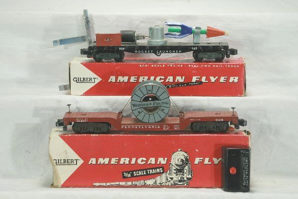 Boxed American Flyer S-gauge 969 Rocket & 936 Ree: 25045 rocket launching car, 3 digit on flat car, broken brake wheel, incl. controller and activator, 936 Western Electric reel car-great lettering, ob's, reel car missing flaps 1 side, Has light play 