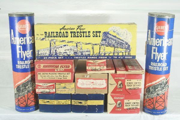 18 Pc Boxed American FlyerS Ga Track and Trestles : 660 Manuel Control left Switch; 728 Remote Control Pair of Switches; 700 Straight Track; 26745 Cross Track; 720 Remote Switches; 26742 Remote Switches; 26320 Remote Switch Right; 26321 Remote Switch L