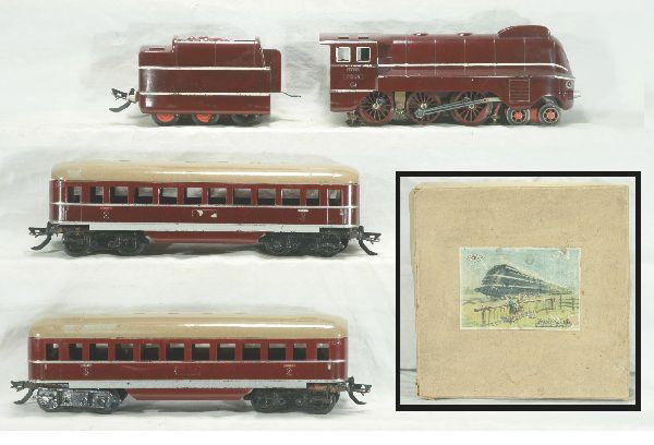 Unusual box Zeuke-Bahn Streamline Train set: German, circa 1930's, FD-50-260 Streamline Steam loco, 3 rail, several die cast side rods missing from fatigue, six wheels matching tender, some paint flaking on wheels, 2 -2nd and 3rd class coaches-