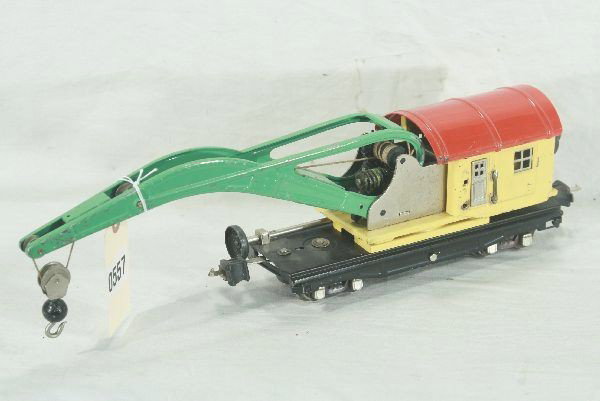 Lionel 810 Derrick: Late colors, manual box couplers, missing 1 handrail, re-geared nicely, working, clean, Has moderate play wear.