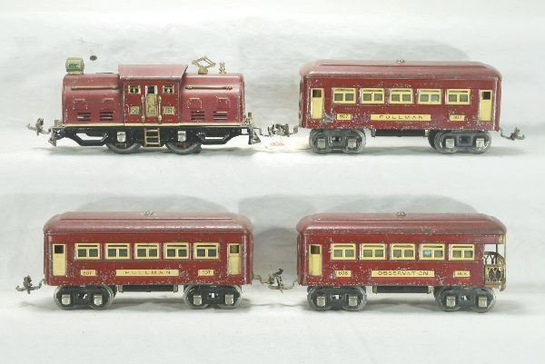 Scarce 4pc Lionel uncatalogued set: Department store special. 252 electric loco, motor incomplete, 2-607 Pullmans, 608 observation, cars lettered Lionel all in rare maroon color, cars each have 1 hole drilled in each end for lighting, o